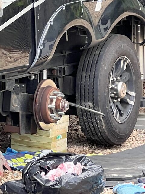 A truck with its tires on the ground