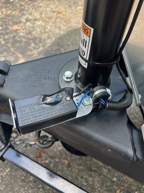 A close up of the seat and brake on a bicycle.